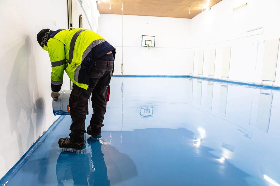 Epoxy resin flooring being applied on site