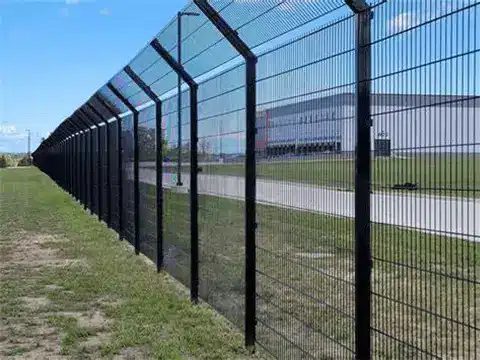 Weldmesh security fencing along a perimeter